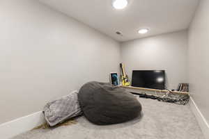 Miscellaneous room with carpet and baseboards