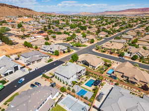 Aerial view of residential area featuring mountains
