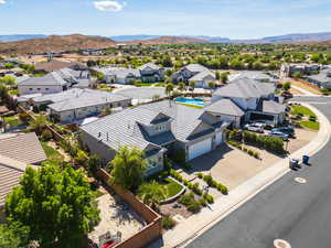 Aerial view of residential area featuring a mountain backdrop