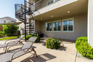 Patio / terrace with stairs and a patio area