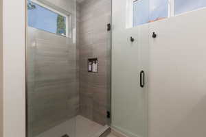 Bathroom featuring a stall shower