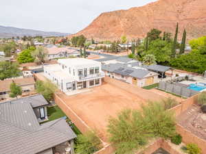Aerial view of residential area featuring a mountain backdrop