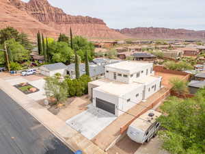 Aerial view of residential area with a mountainous background