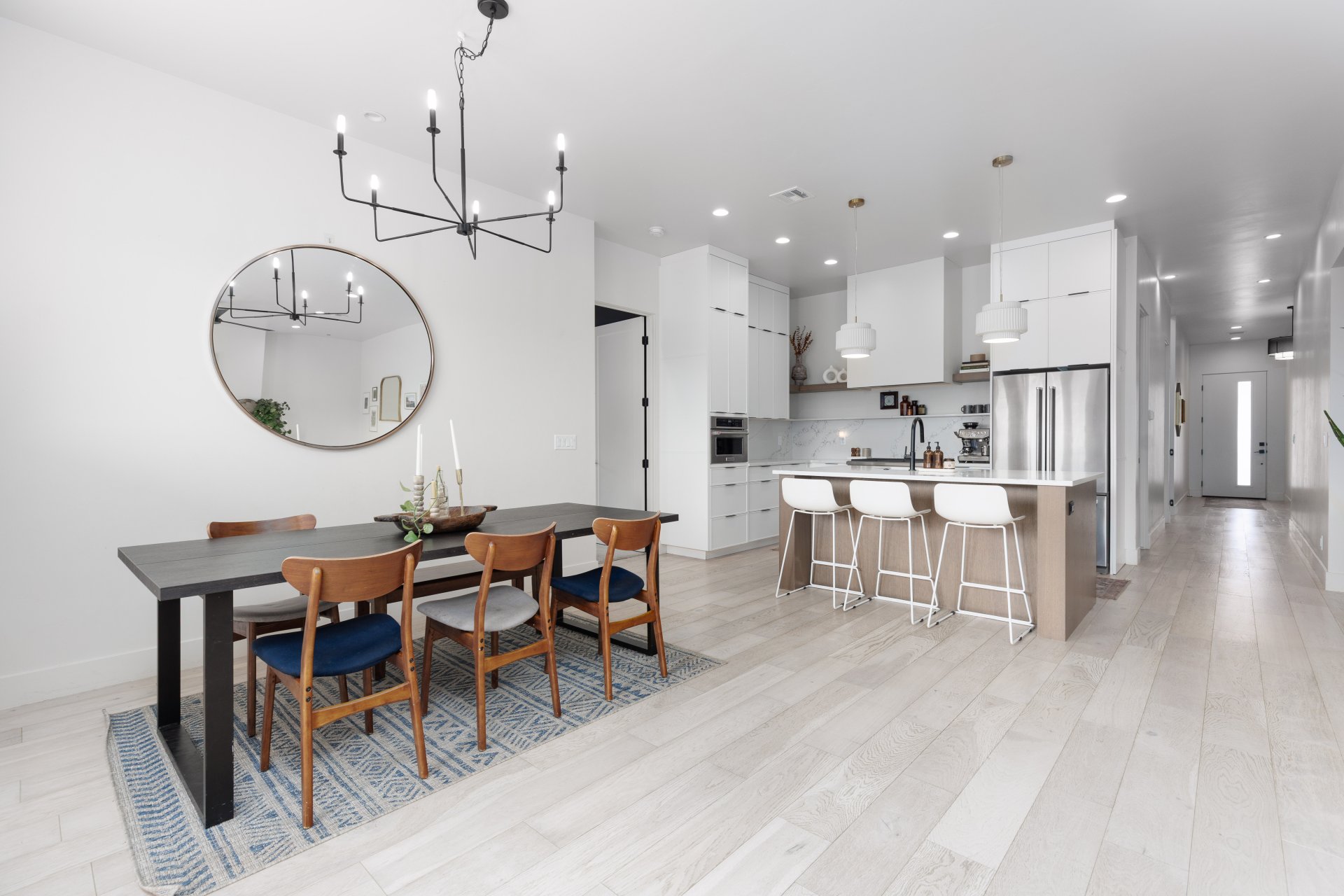 Dining room featuring suspended lighting and light wood finished floors