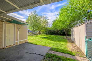 Fenced backyard featuring a patio area