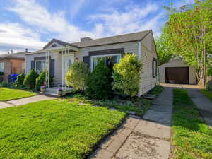 Bungalow with an outbuilding and a garage