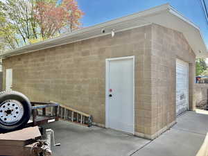 Brick shop w/Garage Entry from back road