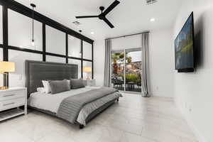 Bedroom featuring access to outside, a ceiling fan, and recessed lighting