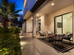 Patio at twilight featuring a patio