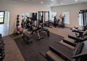 Workout area featuring recessed lighting