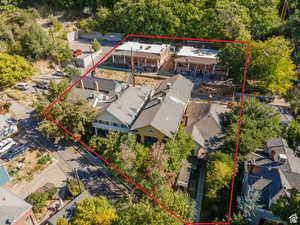 Aerial view of residential area with property parcel outlined