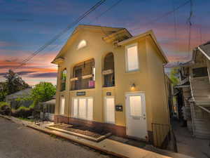 View of front of home with stucco siding