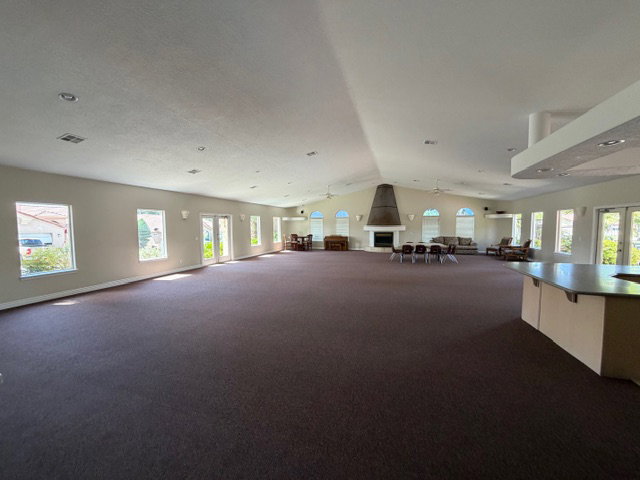 Miscellaneous room featuring a ceiling fan