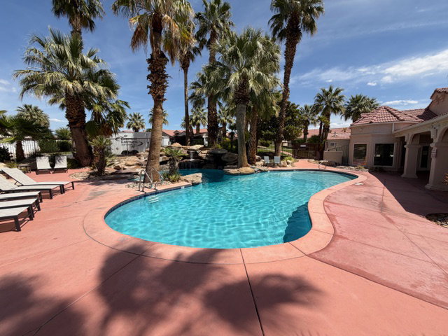 Community pool featuring a patio area