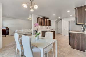 Dining area featuring hanging lights