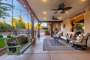View of patio / terrace featuring outdoor seating and a ceiling fan