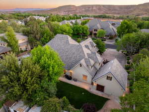 Aerial view at dusk of a residential view and a mountain view