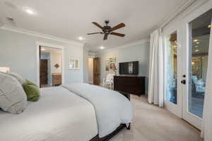Carpeted bedroom featuring access to outside, ornamental molding, a ceiling fan, french doors, and recessed lighting