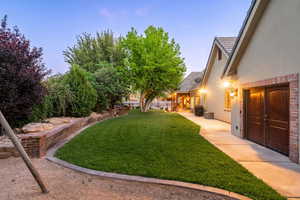 Fenced yard with a patio area