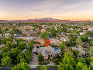 Aerial view of residential area featuring a mountain backdrop