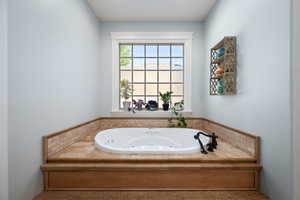 Bathroom with a jetted tub