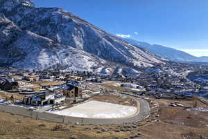 View of mountain backdrop with nearby suburban area