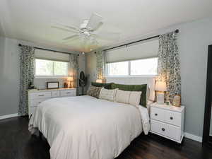 Primary Bedroom featuring dark wood floors