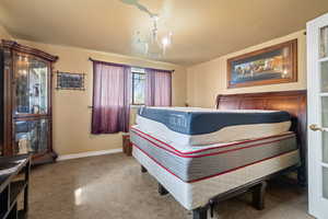 Bedroom with baseboards