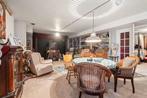 Dining room featuring carpet flooring