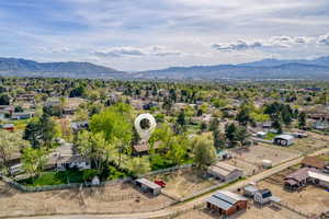 Aerial view of residential area featuring mountains