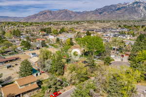 Aerial view of residential area with a mountain backdrop