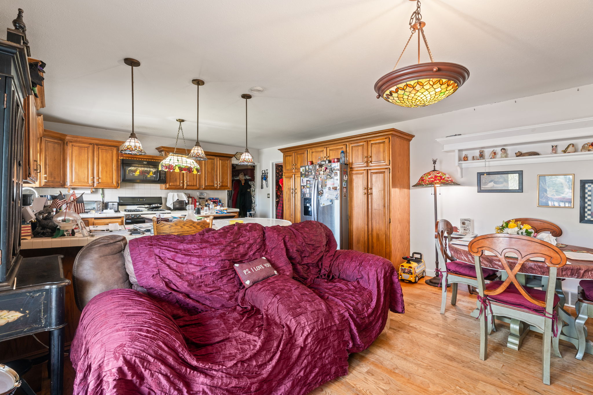 Living room with light wood-style flooring