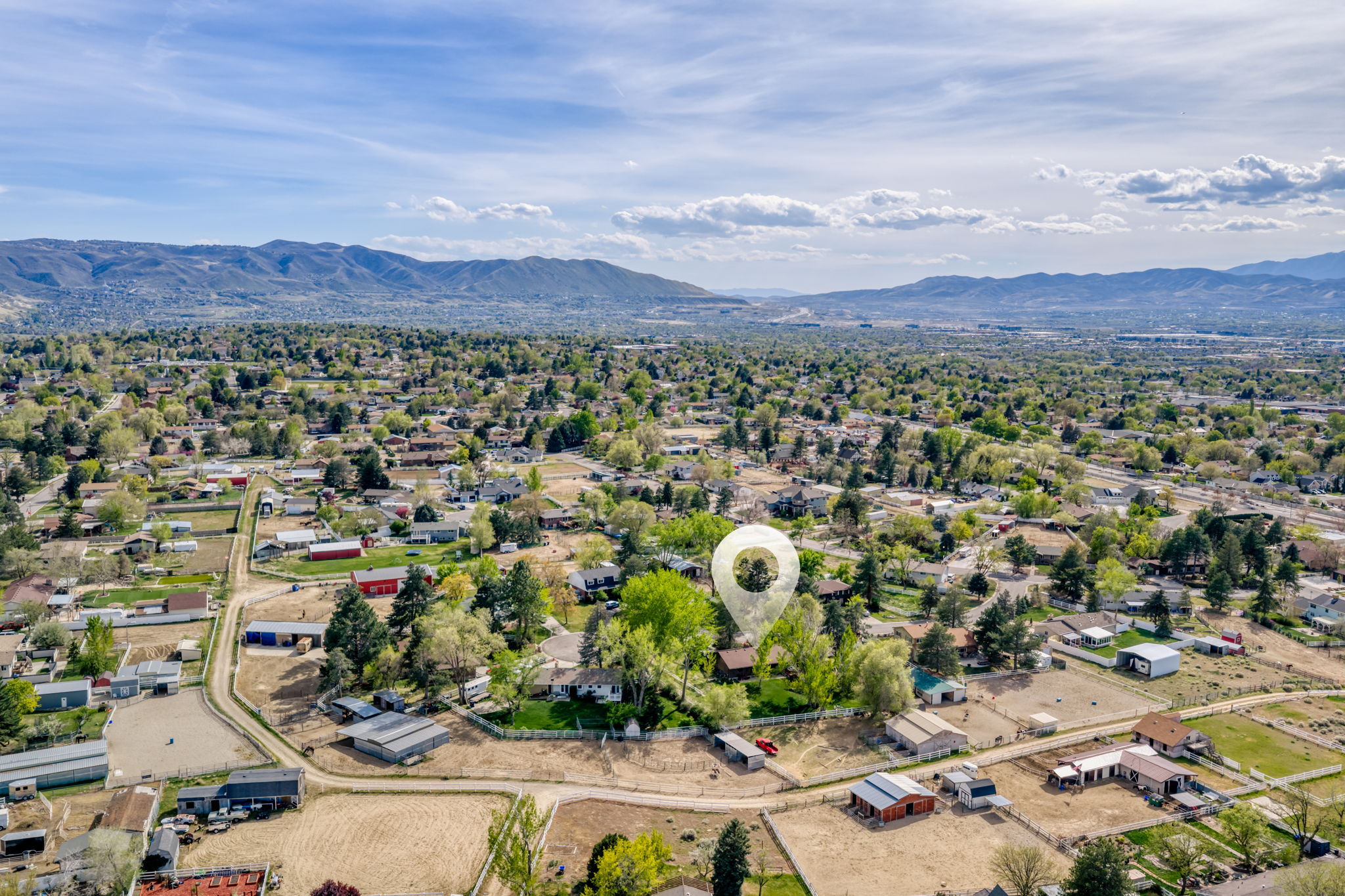 Aerial view of residential area with mountains