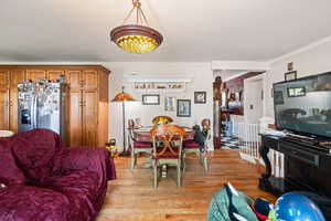 Dining space featuring light wood-type flooring