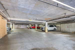 Garage featuring a parking garage