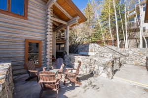 View of patio / terrace featuring an outdoor fire pit