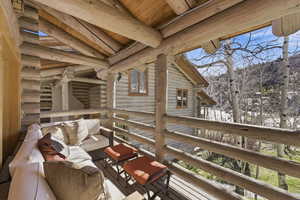 Deck with an outdoor lounge area