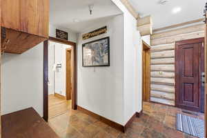 Foyer with baseboards