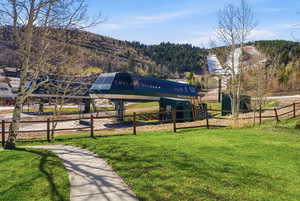 View of property's community with an outbuilding and a mountain view