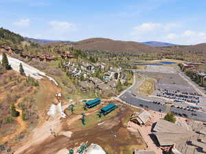Aerial perspective of suburban area with a mountain backdrop