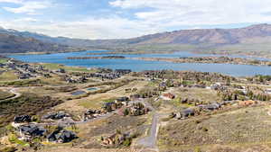 Aerial view of residential area with a water and mountain view