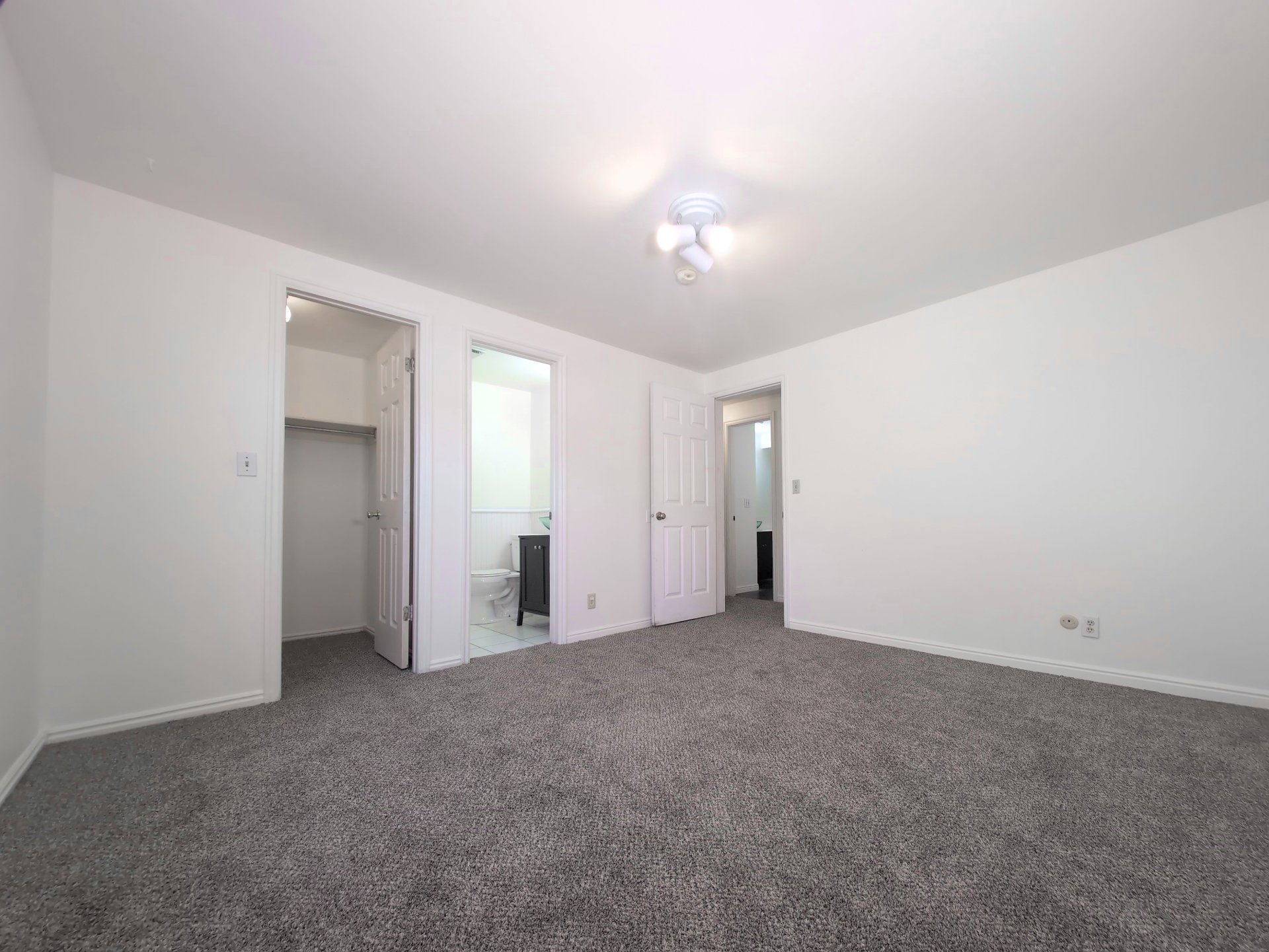 Primary Bedroom with attached bathroom suite