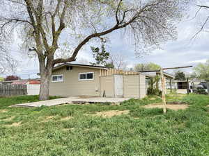 Back of property featuring a patio