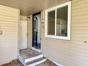 Property entrance with a porch
