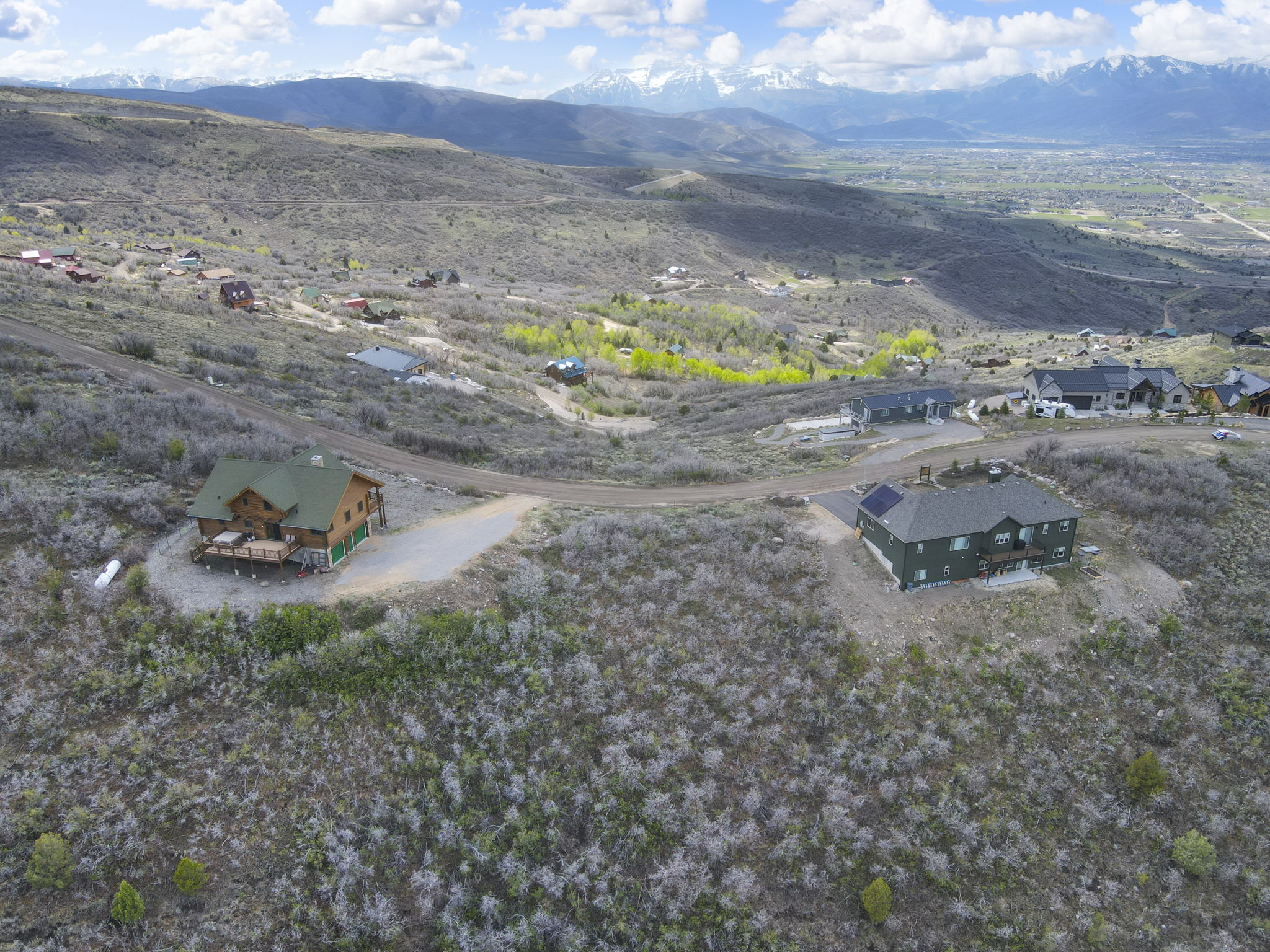 Aerial overview of property's location with mountains