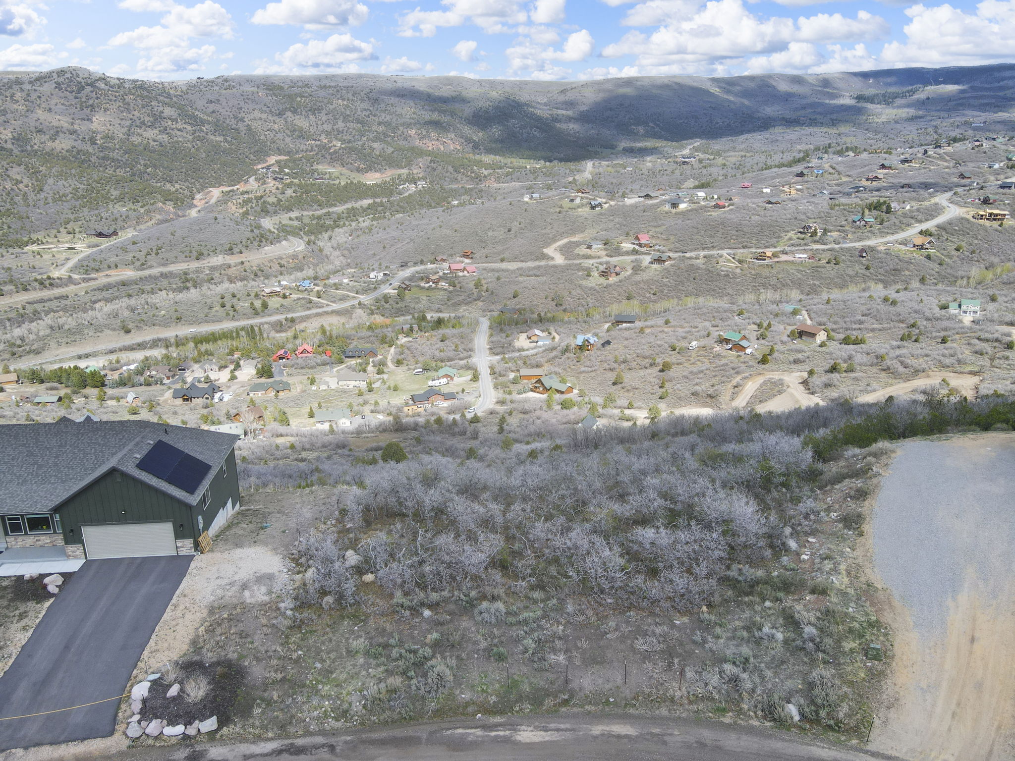 Drone / aerial view of a mountainous background