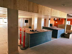 Reception area featuring wooden walls