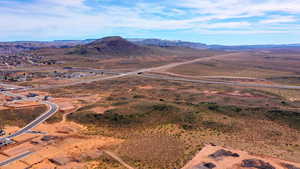 View of mountain backdrop featuring rural landscape