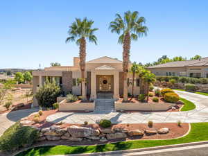 View of front of home with stucco siding