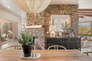 Dining room featuring a fireplace, recessed lighting, and a textured ceiling
